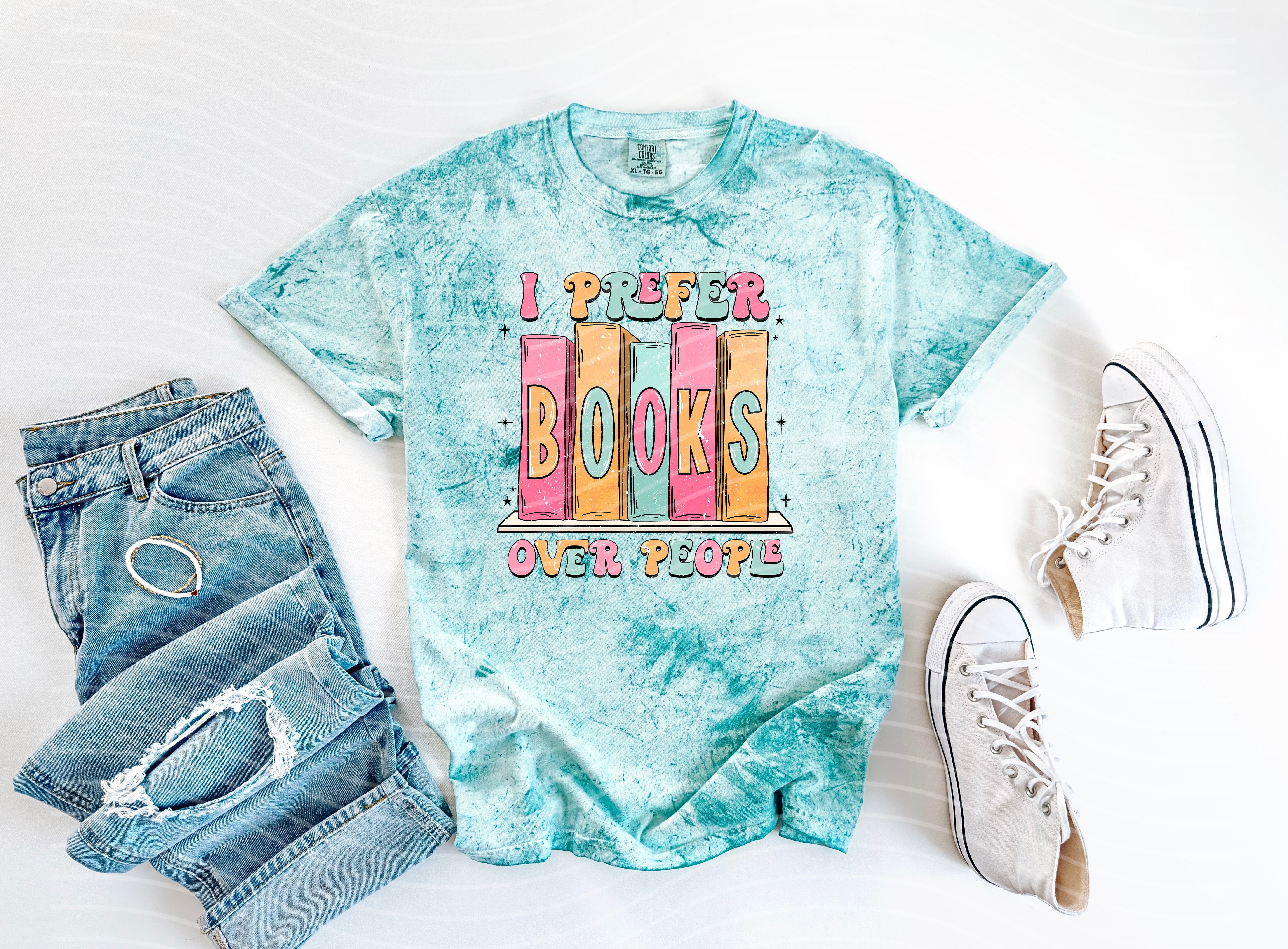 Black graphic tee from Anchored Grace Boutique featuring the phrase "I Prefer Books Over People" in bold white text.
