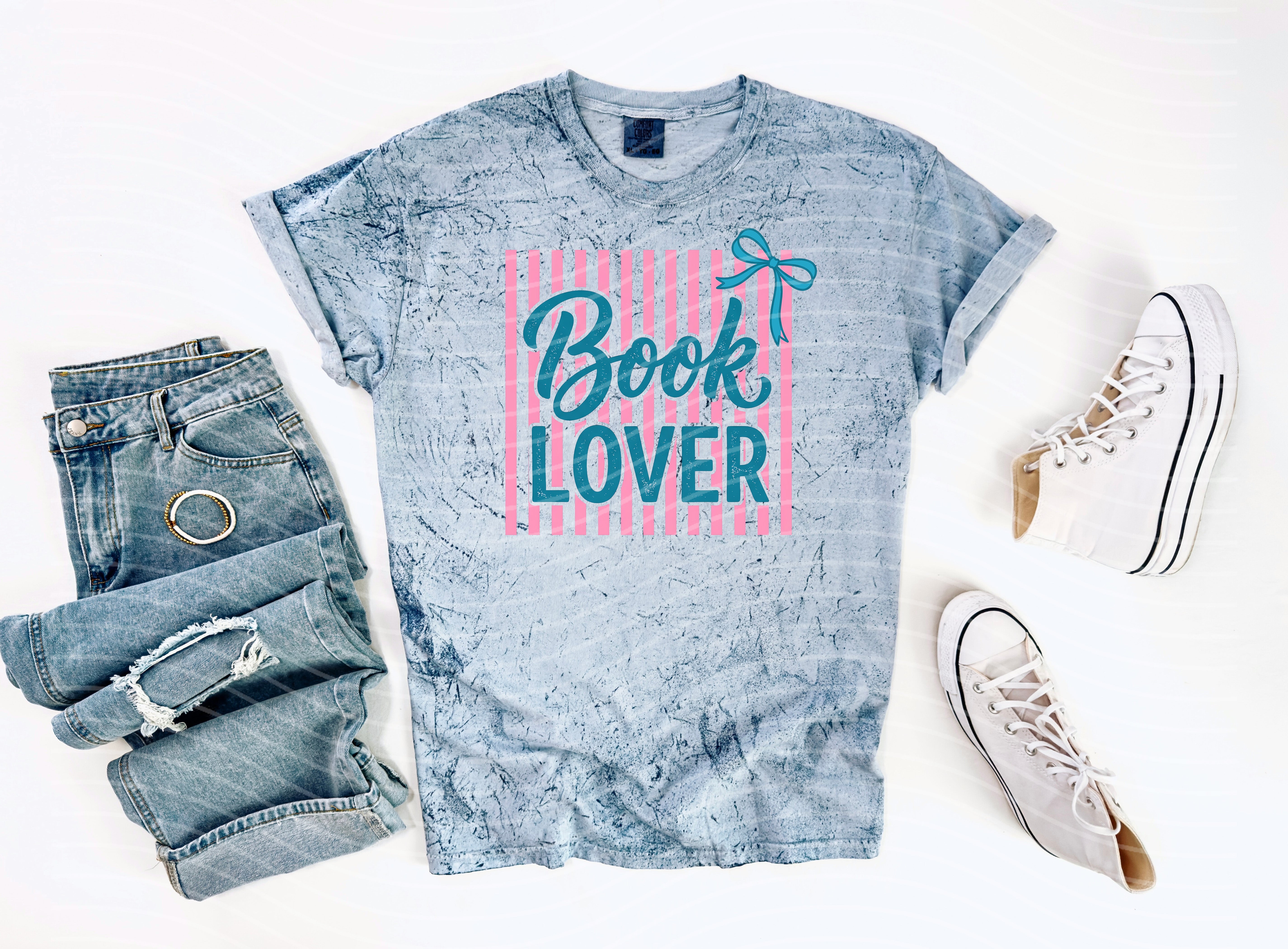 Black Book Lover graphic tee by Anchored Grace Boutique featuring a literary-themed design on a casual cotton t-shirt.