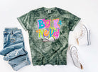 Black graphic tee featuring a book nerd design from Anchored Grace Boutique, casual clothing for book lovers.