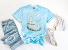 Anchored Grace Boutique Hedwig & Castle graphic tee featuring a colorful Harry Potter-inspired design on a casual cotton shirt.