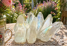 Lemurian Quartz point from 1 Practical Magic Store, clear crystalline crystal with natural striations, polished tip and rough base.