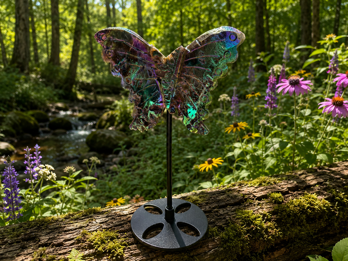 Angel Aura Sphalerite butterfly on stand, showcasing iridescent angel aura crystal with intricate butterfly design and supportive display stand.