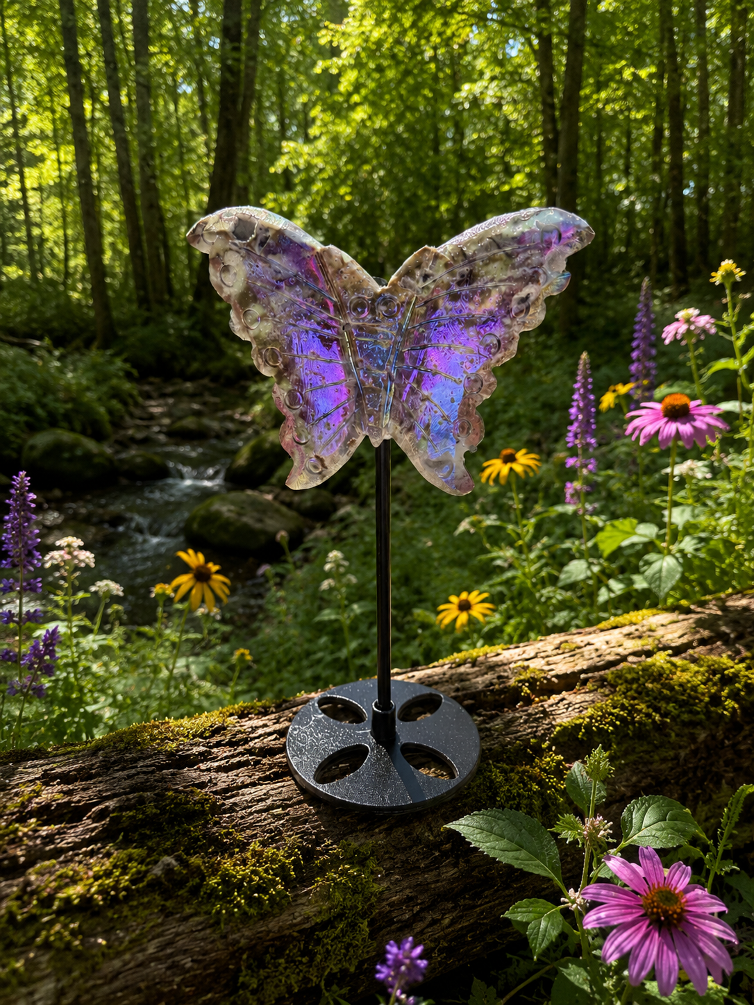 Angel Aura Sphalerite butterfly gemstone on stand, featuring iridescent rainbow hues and intricate wing details.