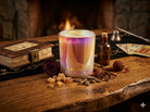 Handpoured wickless soy wax candle labeled "Magic" by 1 Practical Magic Store, featuring a decorative design and soft glow.