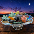 Natural crystal crescent moon stone carving with a polished finish, showcasing intricate details and a mystical appearance.