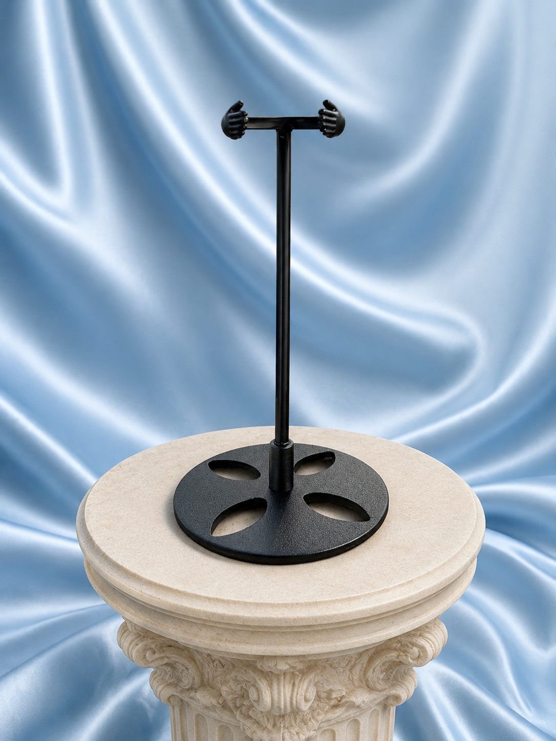 Elegant wand stand from 1 Practical Magic Store holding a magic wand, made of dark wood with intricate carvings.