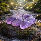 Amethyst heart-shaped crystal from 1 Practical Magic Store, smooth purple gemstone with natural facets and polished finish.