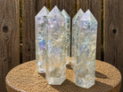 Angel Aura clear crackle quartz tower from Practical Magic Store, showcasing a shimmering, crackled quartz crystal specimen.