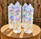 Angel Aura clear crackle quartz tower, a spiritual healing crystal generator with shimmering, crackled glass appearance.