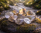 Smoky quartz heart-shaped gemstone from Practical Magic Store, polished and smooth with a deep smoky brown color.