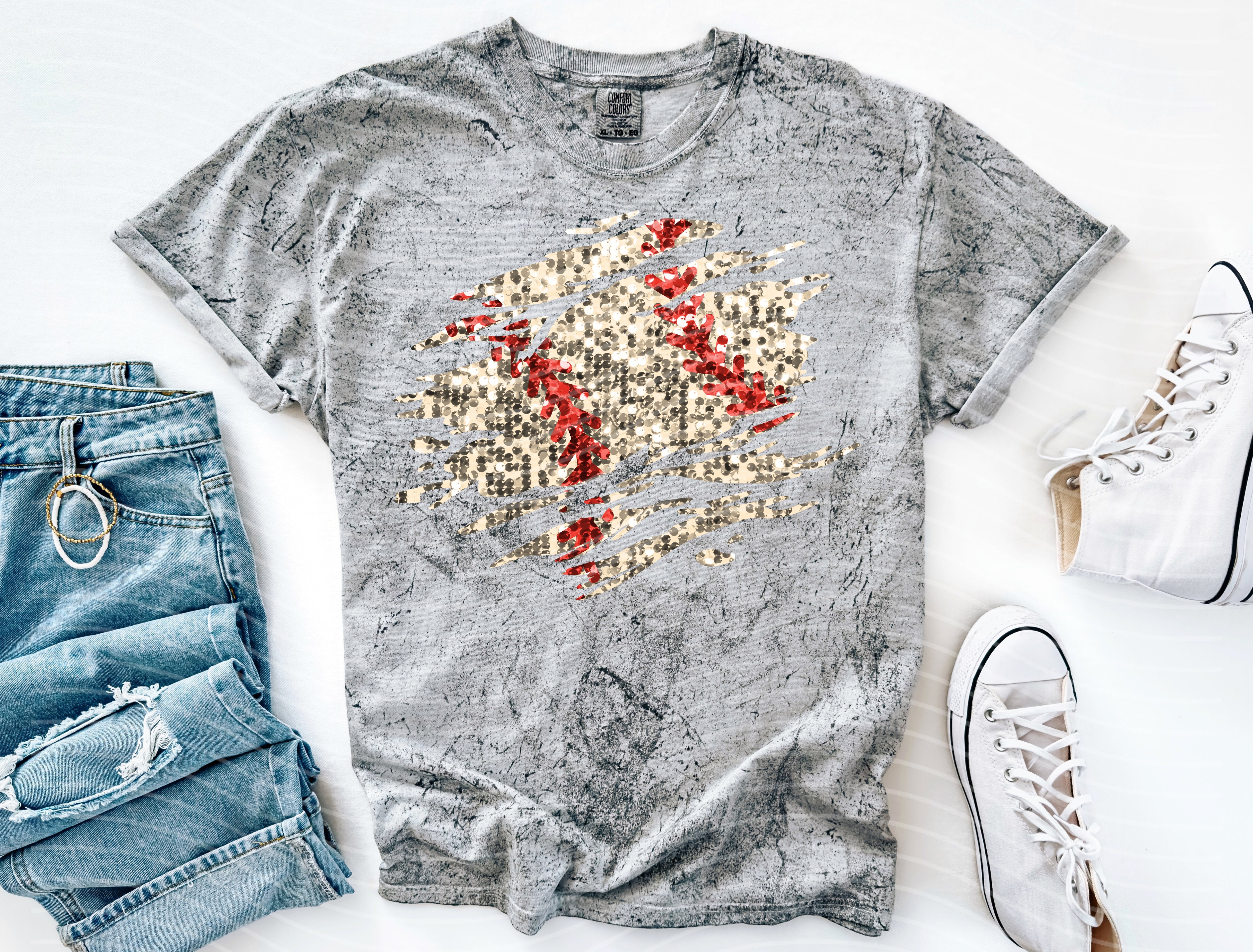 Faux glitter baseball graphic tee from Anchored Grace Boutique featuring a sporty design and casual fit.