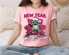Black graphic tee with "New Year Same Hot Mess" slogan from Anchored Grace Boutique, displayed flat with rolled sleeves.