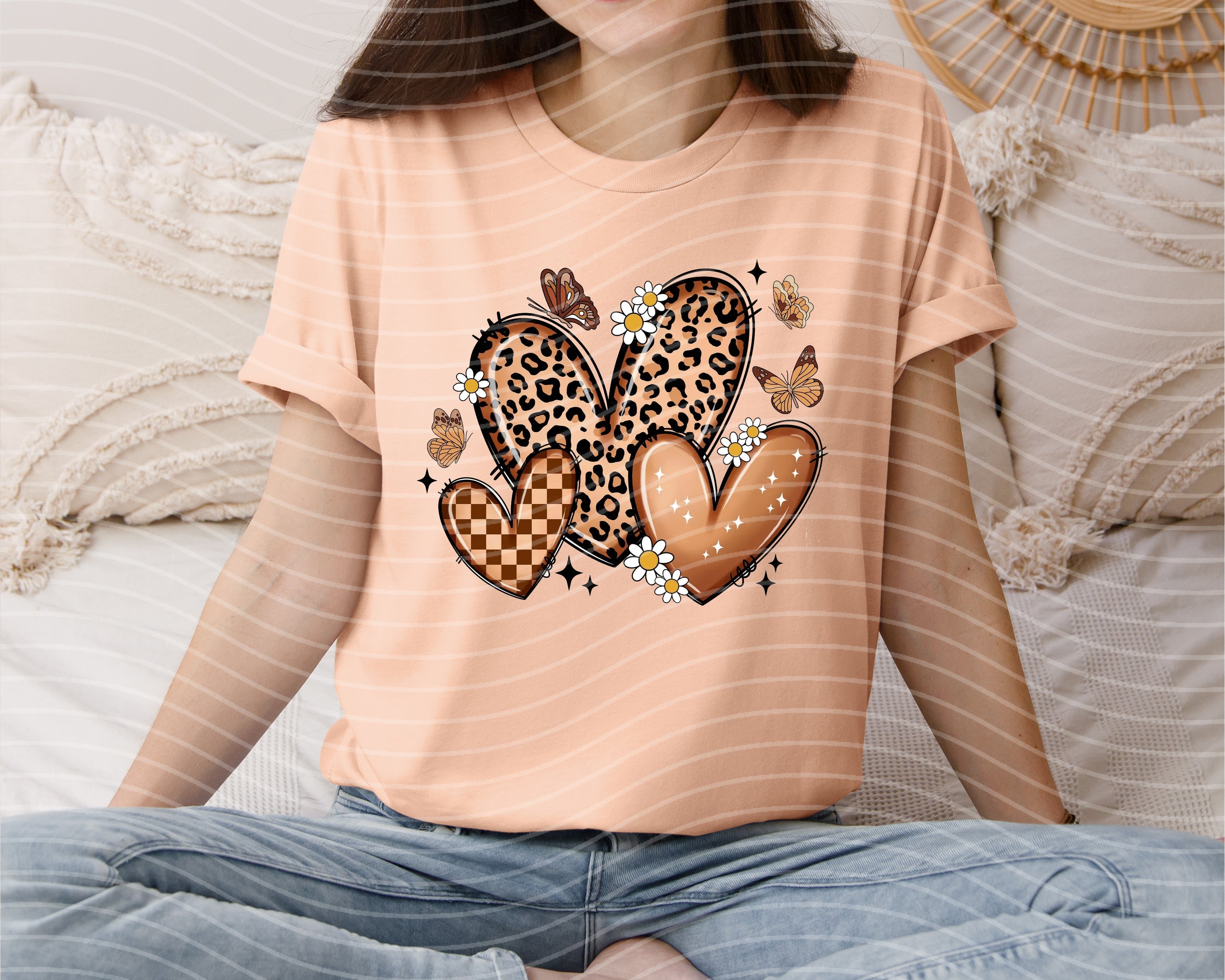 Black monochromatic hearts graphic tee from Anchored Grace Boutique featuring a stylish heart print on soft cotton fabric.