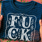 Anchored Grace Boutique floral graphic tee featuring vibrant floral designs on a casual cotton t-shirt.