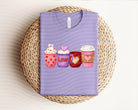 Love Coffee Yarn graphic tee by Anchored Grace Boutique, casual t-shirt featuring colorful yarn and love coffee design.