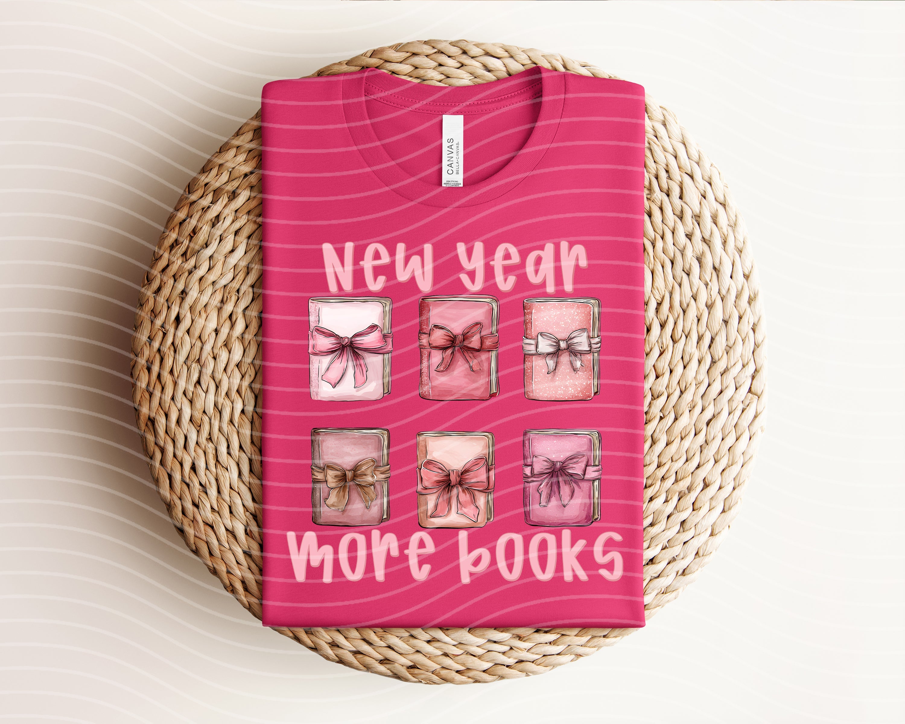 Graphic tee by Anchored Grace Boutique featuring "New Year More Books" design, casual short-sleeve shirt with colorful print.