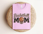 Basketball Mom yarn graphic tee by Anchored Grace Boutique featuring a colorful basketball and yarn design on a casual tee