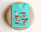 Black Love You Long Time graphic tee by Anchored Grace Boutique featuring bold white lettering on soft cotton fabric.