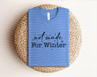 Not Made for Winter graphic tee by Anchored Grace Boutique, featuring a stylish design on a casual cotton t-shirt.