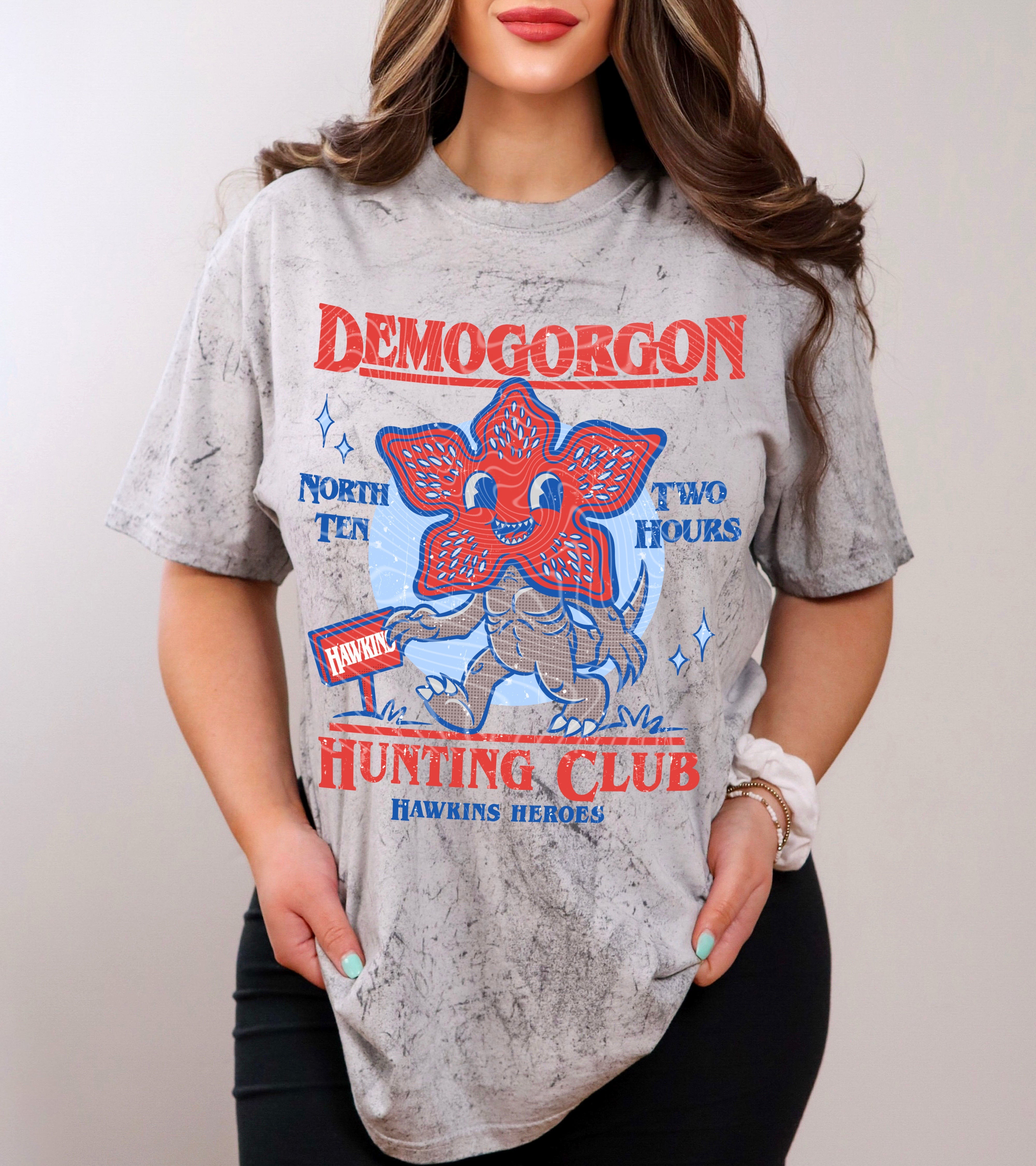 Demogorgon Hunting Club graphic tee from Anchored Grace Boutique, featuring a detailed monster design on a casual cotton t-shirt.