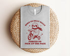Born to Dilly Dally graphic tee by Anchored Grace Boutique featuring a casual design and playful print on soft fabric.