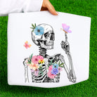 Spring Skelly graphic tee by Anchored Grace Boutique featuring a colorful skeleton design on a casual cotton t-shirt.