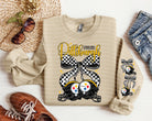 Pittsburgh Cherries graphic tee by Anchored Grace Boutique featuring a vibrant cherry design on a casual t-shirt.