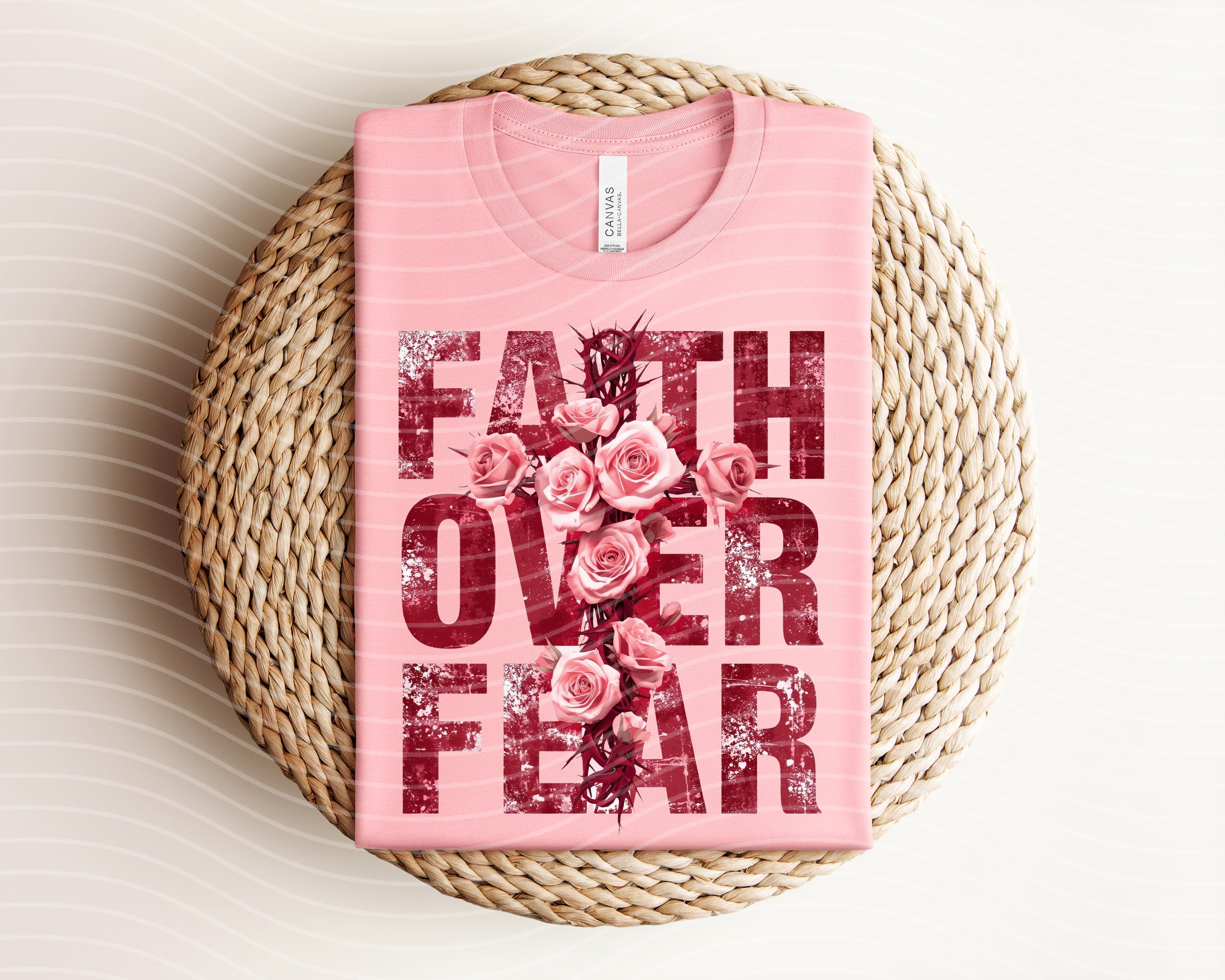 Faith Over Fear graphic tee by Anchored Grace Boutique, showing a stylish black t-shirt with inspirational text design.