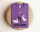 Goose Bumps graphic tee by Anchored Grace Boutique featuring a bold, colorful spooky design on a casual cotton shirt.