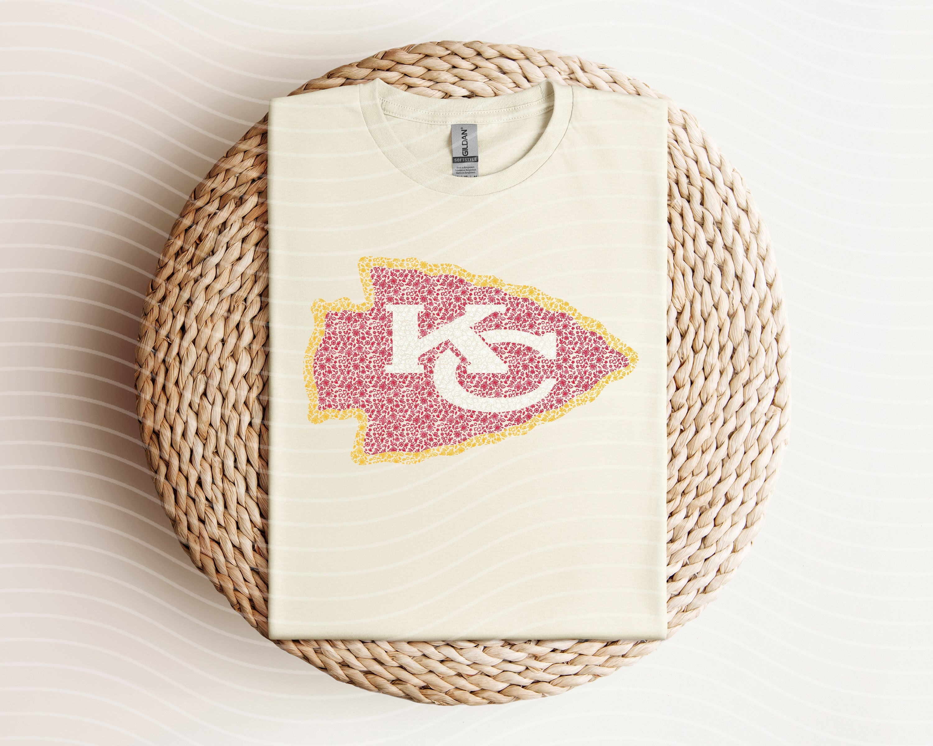 Floral Chiefs graphic tee by Anchored Grace Boutique featuring vibrant floral design on a casual cotton t-shirt.
