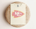 Floral Chiefs graphic tee by Anchored Grace Boutique featuring vibrant floral design on a casual cotton t-shirt.