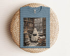 Snowy Ghost graphic tee from Anchored Grace Boutique featuring a winter-themed ghost design on a casual cotton t-shirt.