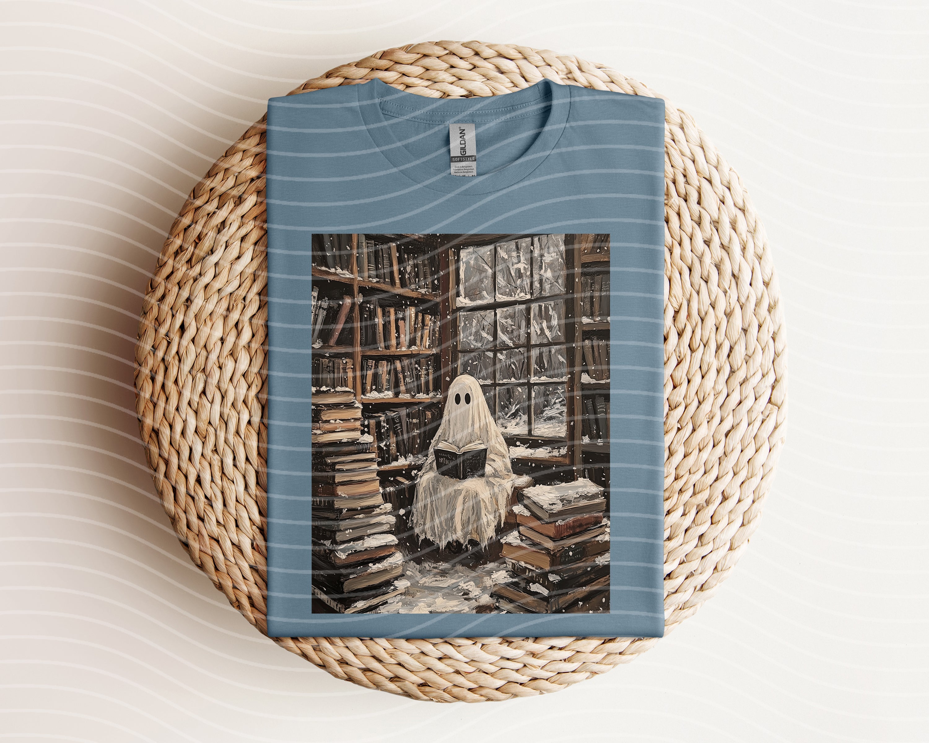 Snowy Ghost graphic tee from Anchored Grace Boutique featuring a winter-themed ghost design on a casual cotton t-shirt.