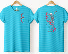 Dancing Skelly graphic tee from Anchored Grace Boutique, featuring a playful skeleton design on a casual cotton t-shirt.