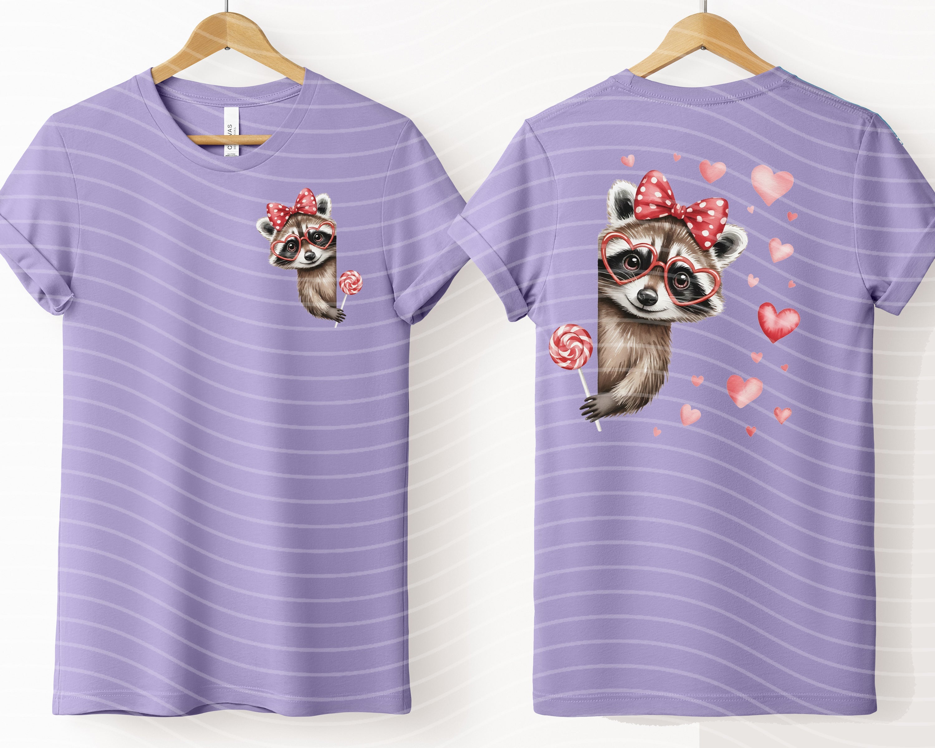 Peeking raccoon graphic tee from Anchored Grace Boutique featuring a playful raccoon illustration on a casual cotton t-shirt.