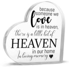 Acrylic memorial heart with a gift box from The Wind Chime Co, featuring engraved "Heaven In Our Home" design and decorative ribbon.