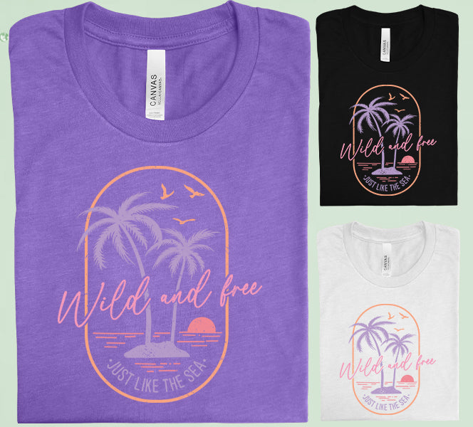 Wild and Free Just Like the Sea graphic tee from Anchored Grace Boutique featuring a beach-inspired design with ocean waves and text.