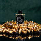 Bottle of Circe Boutique Fast Luck Ritual Oil for good fortune and opportunity, shown with label and decorative background.