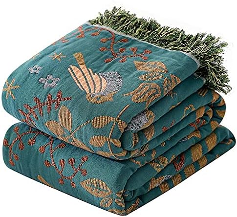 CozyNest Decor boho-style fall throw blanket with bird and flower patterns, perfect for beds, couches, and vintage decor.