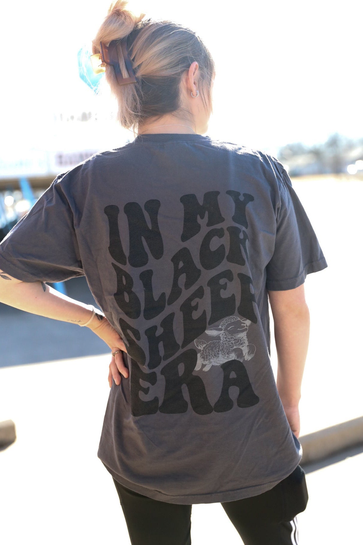 Black Sheep graphic tee or sweatshirt by Shop Karma Tees, featuring a stylish black sheep design on soft fabric.