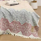 Boho muslin blanket for adults, twin size, soft 4-layer cotton gauze with floral pattern and tassels, cozy summer bed coverlet.
