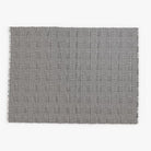 CozyNest Decor outdoor bug shield throw blanket in houndstooth pattern, lightweight insect-repellent blanket for camping, picnics, or beach.