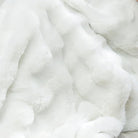 CozyNest Decor ivory faux fur throw blanket with plush, fluffy double-sided rabbit fur for couch, bed, or sofa, 63x79 inches.