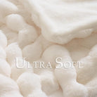 Cream white CozyNest Decor faux fur throw blanket 50x60 inches, thick, fluffy, soft bubble design for couch or home decor.