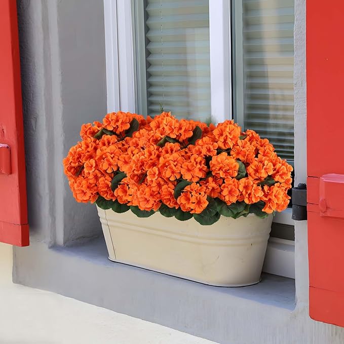 Set of 12 orange artificial geranium flowers for outdoor decor, UV-resistant silk plants perfect for autumn table centerpieces.