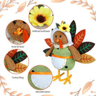 Two plush stuffed turkey figurines with dangling legs, cozyNest Decor autumn harvest tabletop decor for fall and Thanksgiving celebrations.