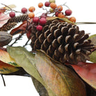 CozyNest Decor 24-inch artificial fall magnolia leaf wreath with orange pinecones, berries, and autumn leaves for wall or door decor.