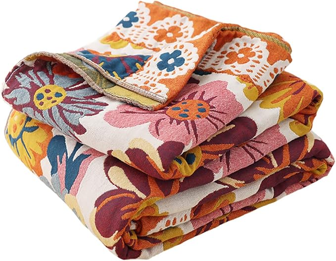 CozyNest Decor boho muslin twin size cotton bed blanket with daisy floral pattern, soft, breathable, perfect for sofa or bed.