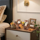 Set of two CozyNest Decor fall fox figurines with pumpkins, handmade sisal woodland decorations for tables or shelves.