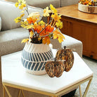 Set of two CozyNest Decor feathered pumpkin centerpieces in natural fall colors, perfect for Thanksgiving or autumn harvest decor.